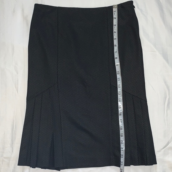 BeBe Skirt, Size 2. Good used condition. Pleaded on the sides. Runs big - Picture 4 of 6